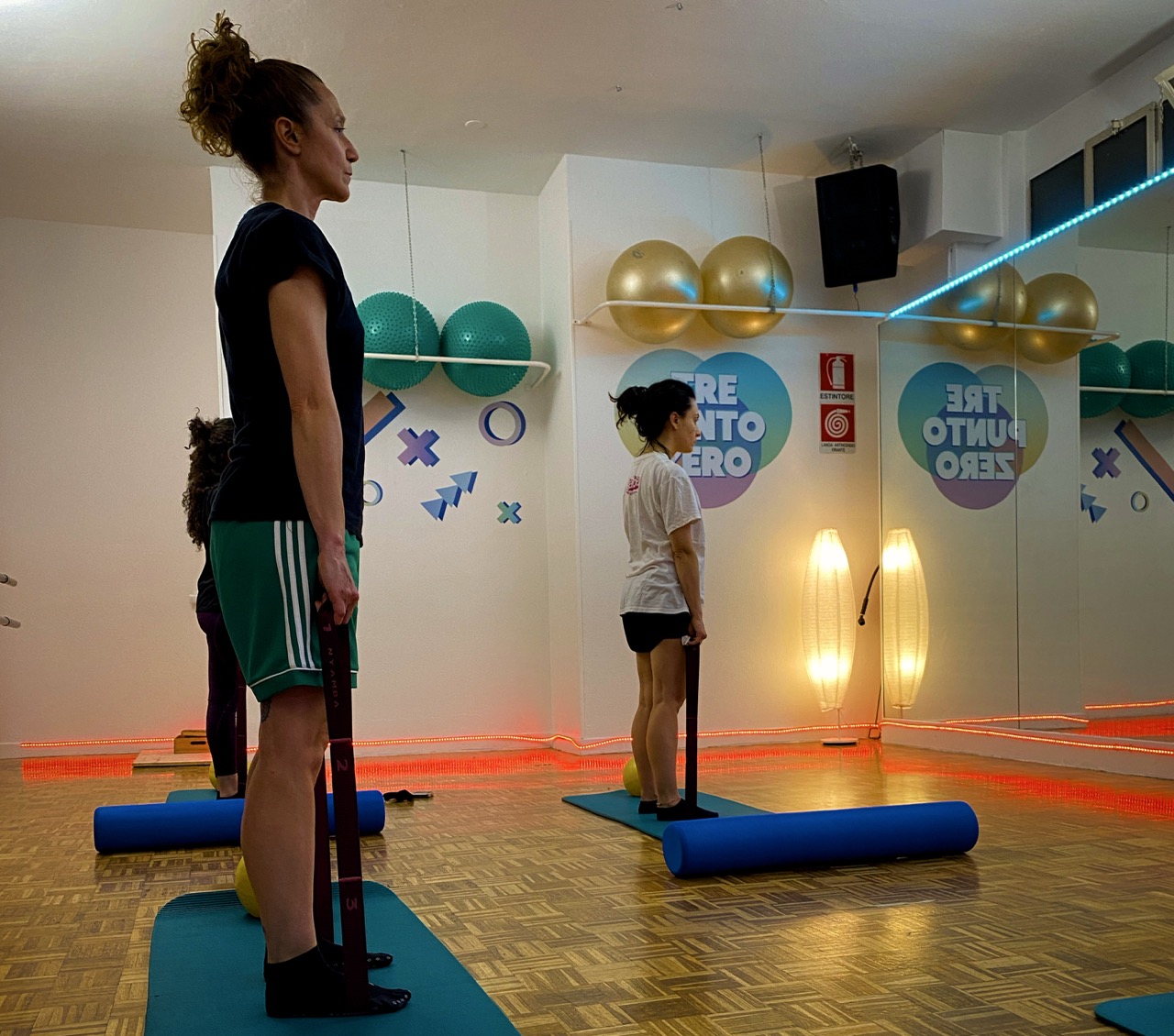 Lezione di Pilates per forza, elasticità e controllo del corpo